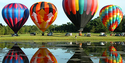 Reflections of hot air balloons lifting off from our launch site at the Hunterdon Hills Playhouse on a beautiful summer afternoon
